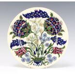 A Zsolnay plate decorated with stylised flowers 21cm