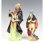 A Royal Doulton figure of The Pied Piper HN2102 24cm and Blue Beard HN2105 27cm