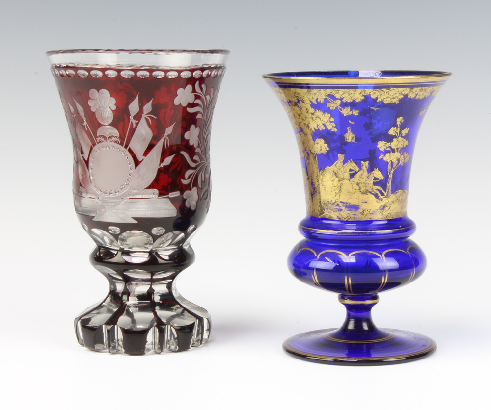 A 19th Century Bohemian red flash glass vase decorated with military motifs and flowers 15cm