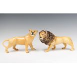 A Beswick figure of a lion facing left no.2089 by Graham Tongue 14cm, golden brown gloss and a