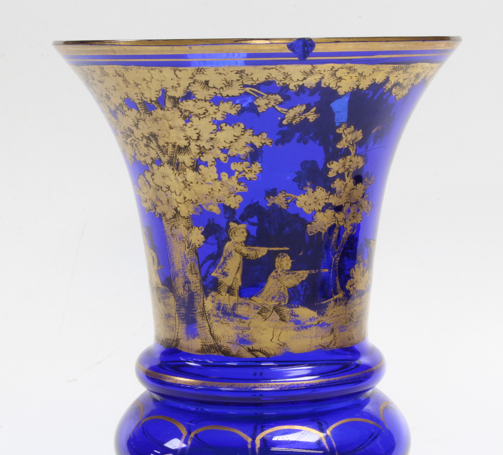 A 19th Century Bohemian red flash glass vase decorated with military motifs and flowers 15cm - Image 2 of 2