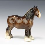 A Beswick figure of a standing shire horse no.818, brown gloss by Arthur Gredington 21.6cm