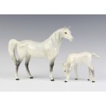 A Beswick figure Arab Xayal by Arthur Greddington, gloss grey 15.9cm together with a ditto foal head