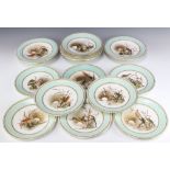 A Royal Worcester dessert service decorated with frogs and insects comprising 3 tazzas and 11 plates