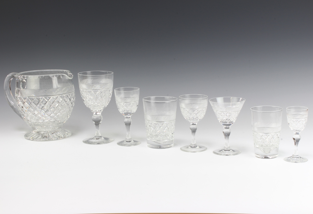 A suite of Webb Crystal table glassware comprising 6 large wine glasses, 6 cocktails, 5 sherry, 5