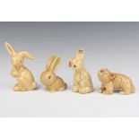 A Sylvac tan rabbit 534 14cm, a seated ditto 1067 10cm, a seated terrier 13cm and a bear cub 1423