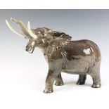 A Beswick figure of an elephant with trunk stretching large, no. 998 by Arthur Greddington 26cm,