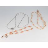 A 9ct white gold necklace and heart pendant 2.9 grams, a coral and baroque pearl necklace and