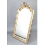 A plate wall mirror contained in a 19th Century gilt arched frame with floral leaf decoration 53cm x