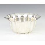 An Edwardian fluted silver bowl, Sheffield 1909, 12cm, 135 grams