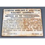 A cast iron sign marked London, Midland and Scottish Railway Co. Notice as To Trespassing 45cm x