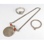 An Eastern silver bangle and minor silver jewellery 190 grams