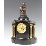 A D Mougin, a Victorian French striking mantel clock with gilt dial and Arabic numerals contained in