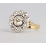 An 18ct yellow gold 11 stone brilliant cut diamond cluster ring 1.75ct, size P 1/2
