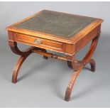A Georgian style square lamp table with inset writing surface, fitted a drawer, raised on X framed