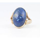 A 9ct yellow gold cabochon cut lapis lazuli ring size I