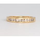 An 18ct yellow gold gem set diamond ring 2.3 grams, size L