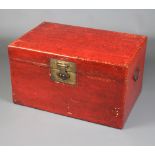 A Chinese red lacquered trunk with hinged lid and brass fittings 43cm h x 76cm w x 49cm d The