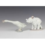 A Lladro figure of an elephant cub with flowers behind its ear 6460 10cm together with a ditto goose