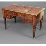 A 19th Century mahogany writing table, the top inset brown leather and with a ratcheted reading