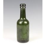 Of railway interest, a green glass club shaped bottle impressed LMS Hotels