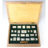 A set of silver commemorative stamps, cased, 482 grams