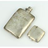 An Edwardian silver vesta Birmingham 1908 and a hip flask 129 gramsThe hip flask is dented