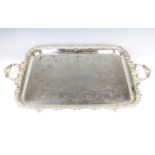 A silver plated 2 handled tray with cased scroll decoration 76cm