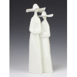 A Lladro group of 2 nuns 33cm One has a stuck head