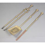 A Victorian brass 3 piece fireside companion set comprising shovel, poker and tongs