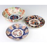 A 19th Century Imari scalloped dish decorated with a vases of flowers 21cm, a ditto dish 21cm and