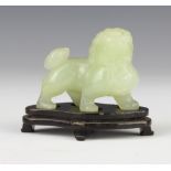 A jade figure of a Buddhist lion 5.5cm