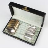 A set of six Continental silver teaspoons, 140 grams, cased