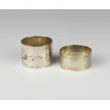 A silver napkin ring Birmingham 1992 and an engine turned ditto, 30 grams