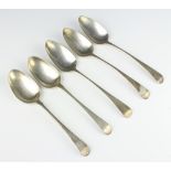 A William IV Old English pattern silver table spoon, London 1833, 4 others, 304 grams