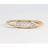 An 18ct yellow gold 5 stone graduated diamond ring, 3 grams, size T