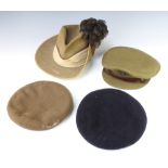 A South African military slouch/side hat with hackle and a Middlesex Officer's service dress cap