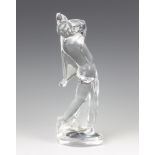 A clear glass Baccarat figure of a golfer 24cm