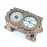 A Crompton Parkinson Ltd. wind direction indicator contained in a brass case 10cm x 29cm x 8cm