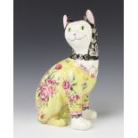 A reproduction figure of a Galle cat the yellow ground decorated with flowers 33cm