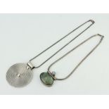 A silver necklace and pendant, a hardstone mounted ditto, 101 grams