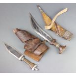 An African double edged dagger with 20cm glade and wooden grip contained in a leather scabbard