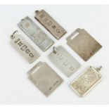 Seven silver pendants, 92 grams
