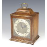 Garrard, a Queen Anne style striking bracket clock with gilt dial and silvered chapter ring