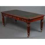 A Victorian style mahogany library table with inset green leather writing surface fitted 2 long