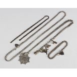 A silver Albert, fob and bracelet with charms, 154 grams