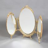 A triple plate dressing table mirror contained in a gilt frame 59cm h x 75cm w