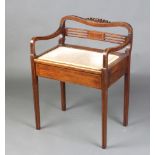 An Edwardian inlaid mahogany bar back box seat piano stool with hinged lid, raised on square tapered