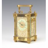 19th Century Continental carriage timepiece with enamelled dial and pierced gilt metal case There is