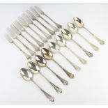 Nine Continental silver dessert spoons and forks, 582 grams